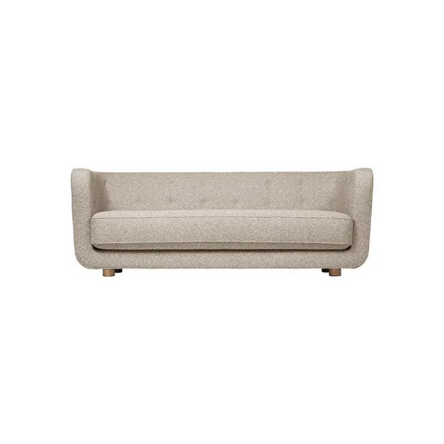 Dark beige and smoked oak sahco zero vilhelm sofa by lassen. Dimensions: w 217 x d 88 x h 80 cm. Materials: textile, oak....