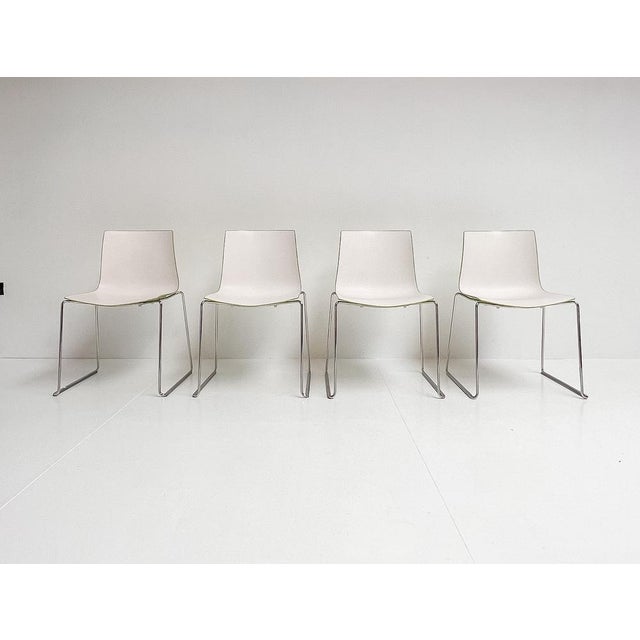 This is the katifa 46 chair by arper. A comfortable and stackable chair, designed in 2004 by lievore altherr molino,...