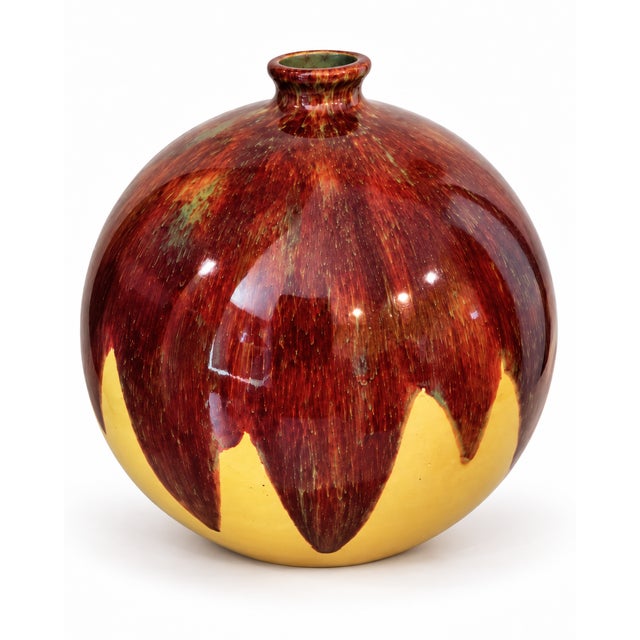 A striking pair of French Puisaye art pottery vases by Jean Maubrou, distinguished by sculptural forms and richly...