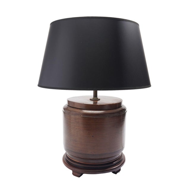 Chinese covered and footed rice box of bamboo with a sewn joint attachment, converted for use as a lamp. The surface...