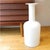 A very beautiful white Gulv vase designed by Otto Brauer for Holmegaard Glass Factory in 1962. This unusual shape and...