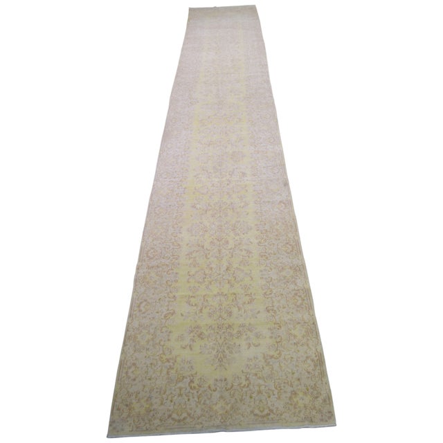 Hand-knotted with care using traditional rug-making techniques, this wool rug blends timeless craftsmanship with a modern...