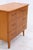 Original vintage chest of drawers in a mid-century design with clean lines and a timeless appeal. Multiple drawers offer...
