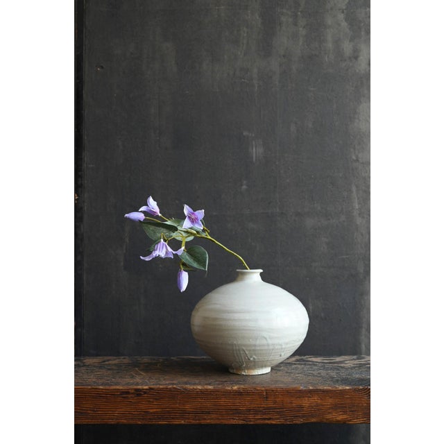 This is a white porcelain jar from the Joseon (Korean) dynasty, made on the Korean Peninsula. Judging from the...