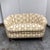 Design Plus Gallery presents a Danish Banana Style Channel Tufted Loveseat. This upholstered loveseat showcases a curved,...