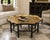 A striking vintage Kittinger octagonal cocktail table featuring an original distressed gold-leaf tray-style top over a...