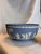 A beautiful serving bowl from the vintage "Sacrifice" pattern of Wedgwood Jasperware in the iconic pale blue and white...
