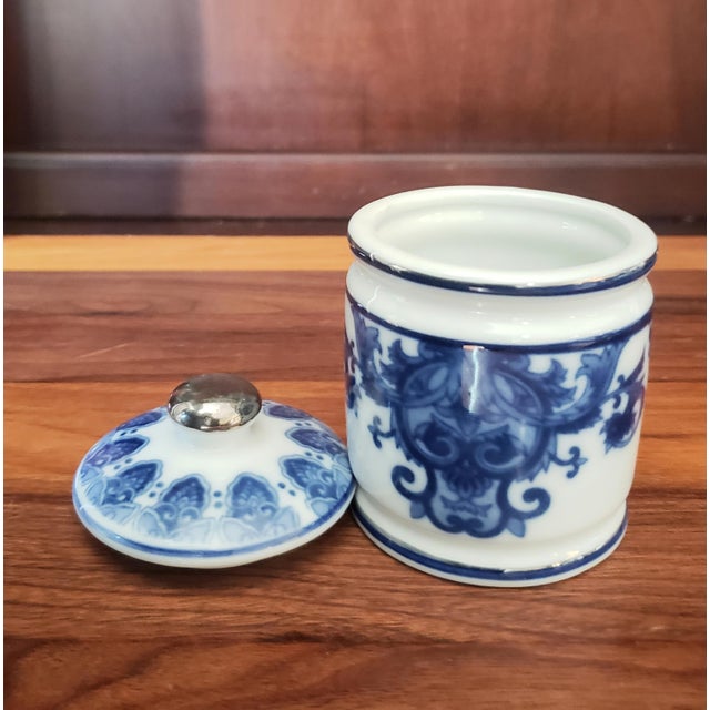 This exquisite vintage Bombay Company blue and white Chinoiserie jar offers. Design & Pattern: It features a distinctive...