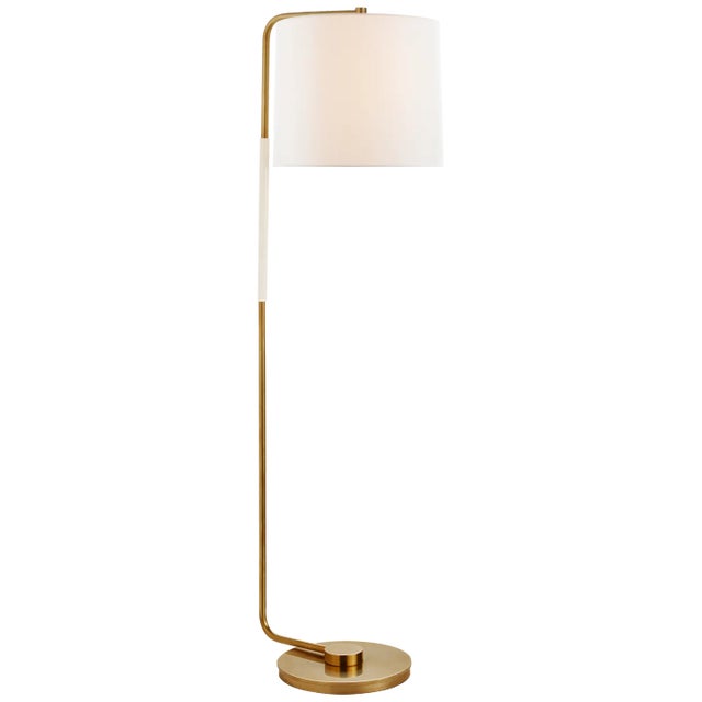 Swing Articulating Floor Lamp in Soft Brass with Linen Shade Designer: Barbara Barry Height: 54.75" Shade Detail: 13.5" x...