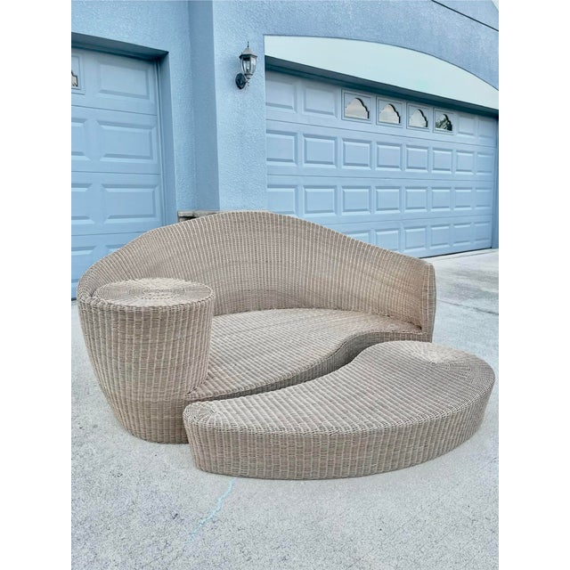 Vintage Dune woven daybed by Vladamir Kagan for Barlow Tyrie. An elegant nautilus-shaped lounge seat with an integrated...