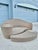 Vintage Dune woven daybed by Vladamir Kagan for Barlow Tyrie. An elegant nautilus-shaped lounge seat with an integrated...