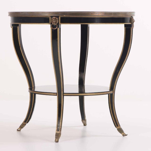 Neoclassical A French Round Marble Top, Ebonized and Gilt Table, C. 1940. For Sale - Image 3 of 6
