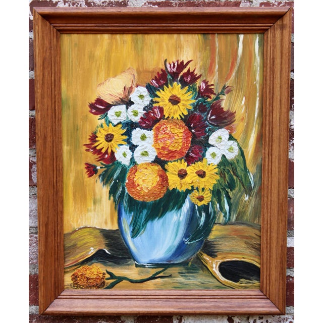 A bright and beautiful vintage floral still life original oil painting on board, signed on the back 1964. This is a well...