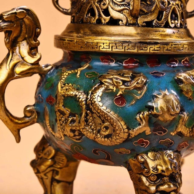 An incredibly ornate and majestic pair of vintage Chinese cloisonné censers (incense burners). These striking vessels are...