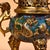 An incredibly ornate and majestic pair of vintage Chinese cloisonné censers (incense burners). These striking vessels are...