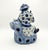 Add classic Chinoiserie elegance to your space with this captivating vintage blue and white glazed porcelain statue. This...