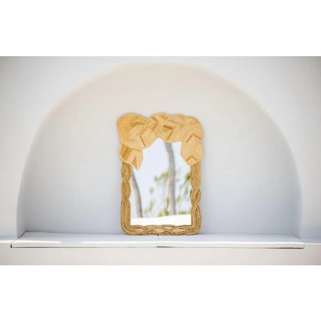 Amazing large rattan mirror with leaves and intertwined vines patterns. Very unique and decorative, its quality is high as...