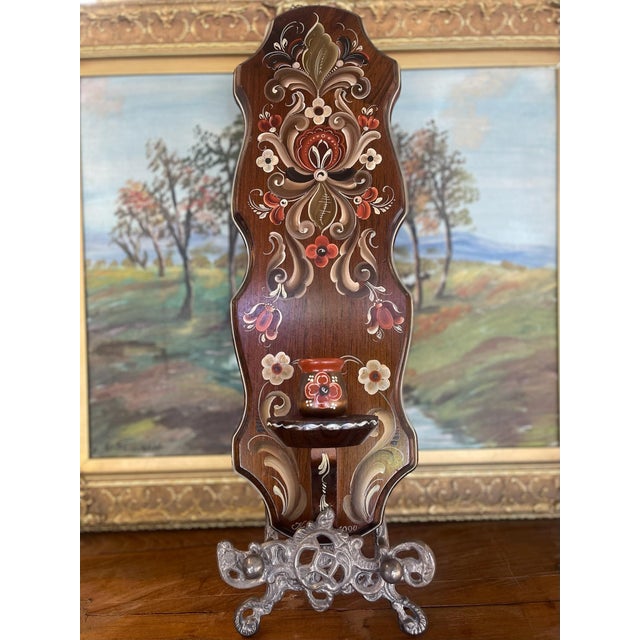 This exquisite possible Norwegian wall pocket showcases traditional rosemaling, a decorative folk art painting style...