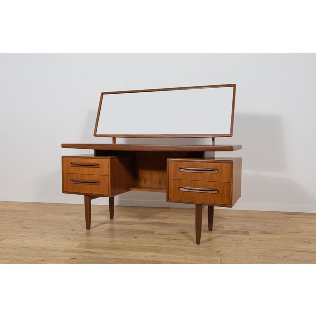Mid-Century Teak Dressing Table from the iconic Fresco range, designed by Victor Wilkins for the renowned British...