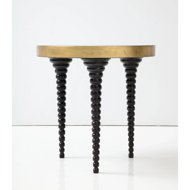 Turned wooden spindle leg table which has been beautifully restored. The legs of the table are in a rich espresso finish...