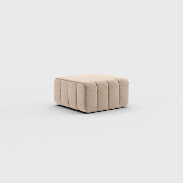 Pouf, stool, ottoman—or simply the building block for what is probably the world’s most versatile sofa system? The Curt...