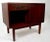 Very good quality Danish modern night table, featuring one drawer, over an open storage cubby, flanked by a door which...