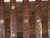 A Moroccan Moorish style accent side chair from the early 20th century, with richly carved décor, mother-of-pearl inlay,...