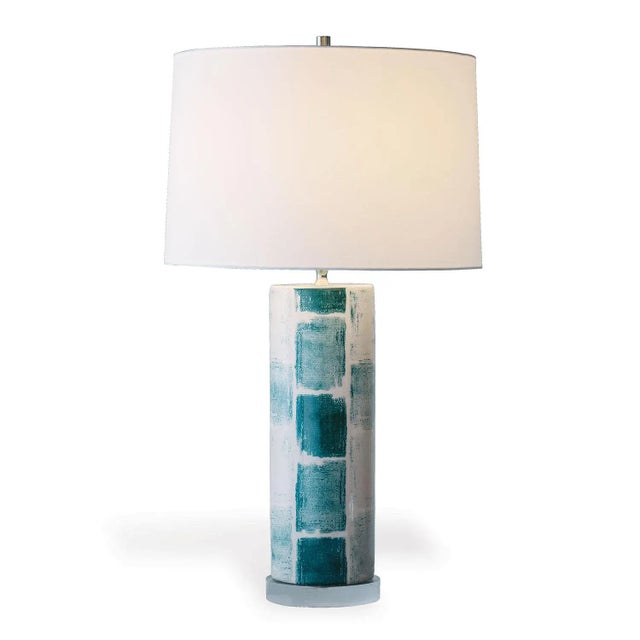 Celadon Tile is our modern cylinder shaped lamp from our Scalamandre' Maison by PORT 68 collection. Celebrating a mix of...