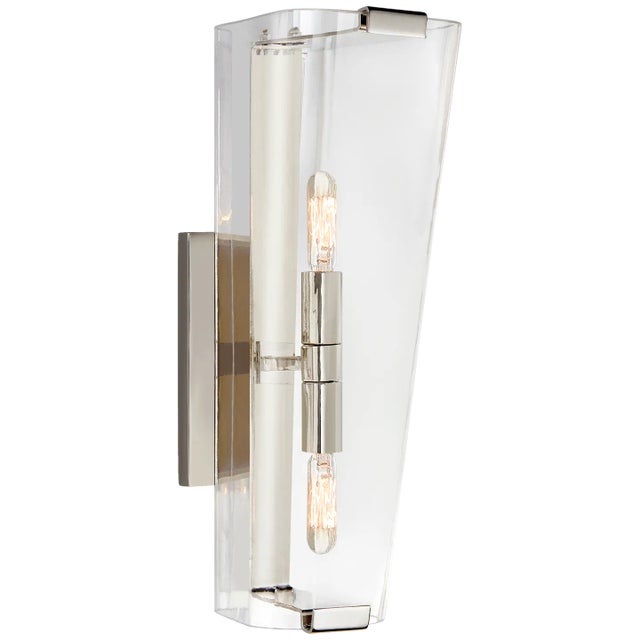 Alpine Single Sconce in Polished Nickel with Clear Glass Designer: AERIN Height: 16.25" Extension: 7.75" Backplate: 4.25"...