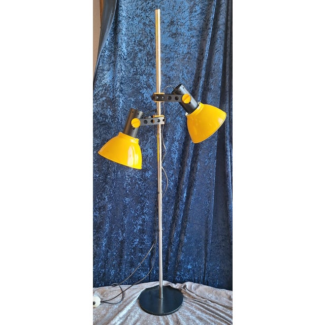 Vintage Floor Lamp with Yellow Clamp Shades on a Chrome-Plated Metal Frame from Temde-Leuchten, 1970s, in Worn conditions....