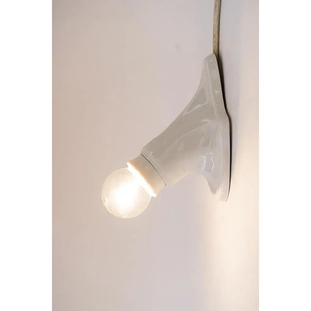 Small art deco porceilain wall lamp germany around 1920s. Original condition. Up to 250V (Europe/UK Standard).The wiring...