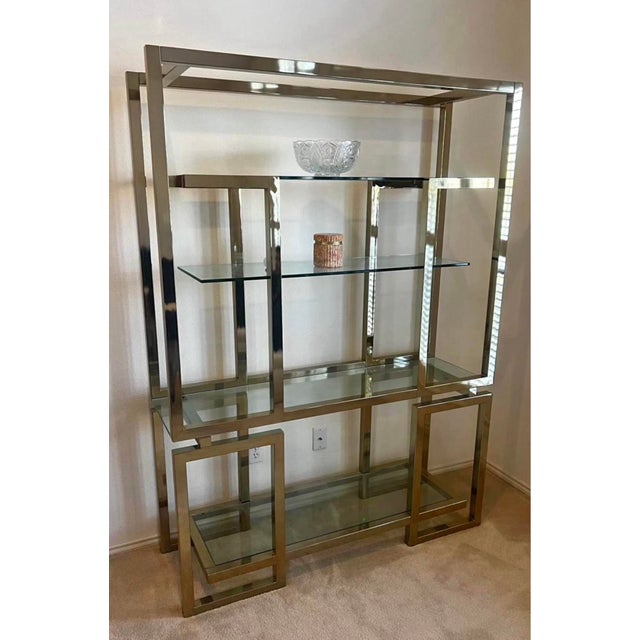 Wonderful Brass plated wall etagere in the style of Milo Baughman. 52"w x 17"d x 72"t