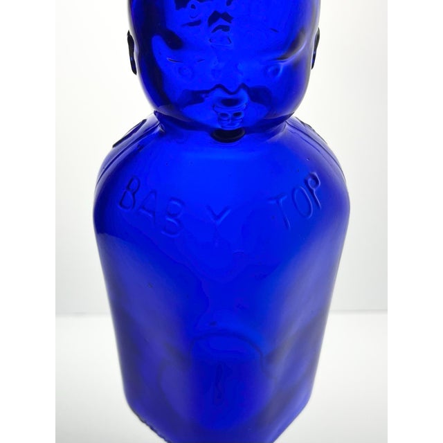 Glass 1930s Vintage Brookfield “Baby Top, Face” Cobalt Blue Glass Bottle For Sale - Image 7 of 11