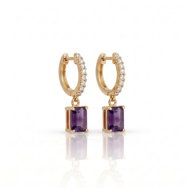 Elevate your daily ensemble with these breathtaking drop huggie hoop earrings featuring a sparkling pavé-set hoop and a...