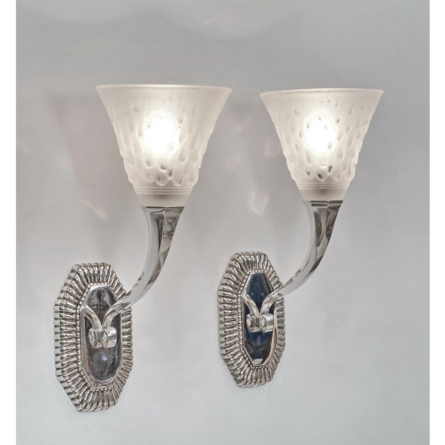 Capon frères & Muller A pair of French art deco wall sconces made circa 1925-1935 in nickel plated solid brass or bronze...