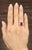 This exquisite certified ruby and natural diamond ring is a captivating piece of modern jewelry, crafted in lustrous 14k...