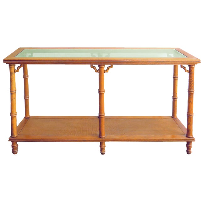 Quality-made faux bamboo, rectangular console table, believed to be from the 1970s. Solid, well-constructed frames with a...