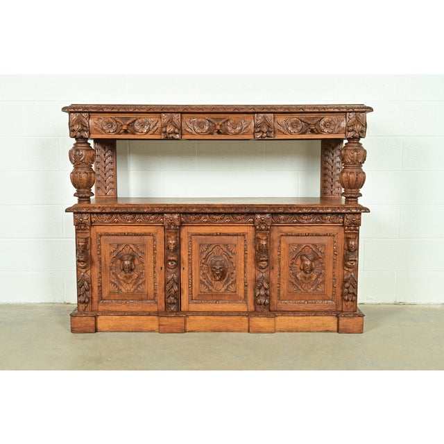 An exceptional antique Victorian or Renaissance Revival sideboard, hunt board, credenza, or bar cabinet In the manner of...