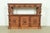 An exceptional antique Victorian or Renaissance Revival sideboard, hunt board, credenza, or bar cabinet In the manner of...