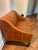 Leather Cognac colored grade E Gourmet G304 cognac leather Settee by WS. Beautiful barely twisted legs with standard nail...