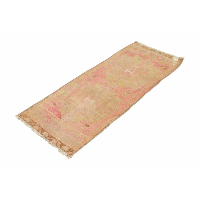 Vintage Handknotted decorative mini rug from Kars region of Turkey. Approximately 45-55 years old. In very good condition.