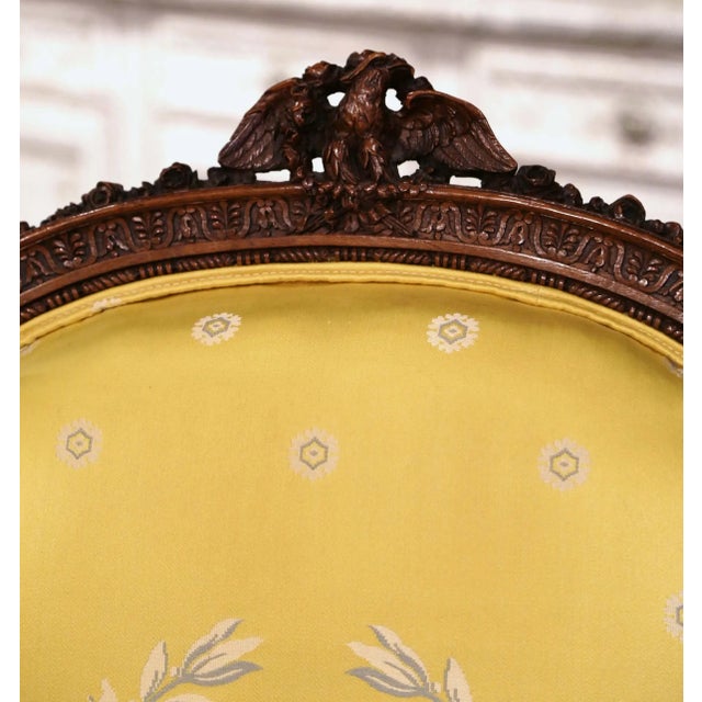 Wood 19th Century French Louis XVI Walnut Bergères With Carved Eagle Crest For Sale - Image 7 of 12
