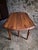 This vintage oak dining table from france, dating from approximately 1950–1970, combines a traditional design with a...