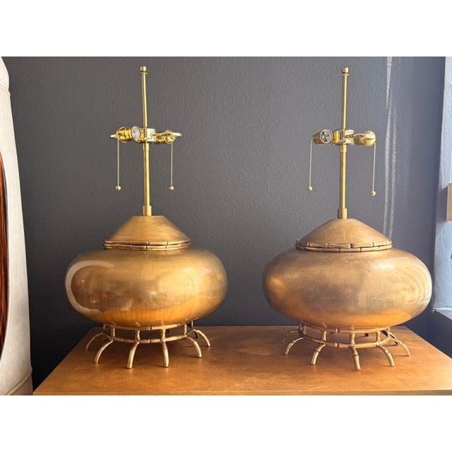 Pair of Asian style Chinoiserie brass ginger jar lamps with bamboo base.