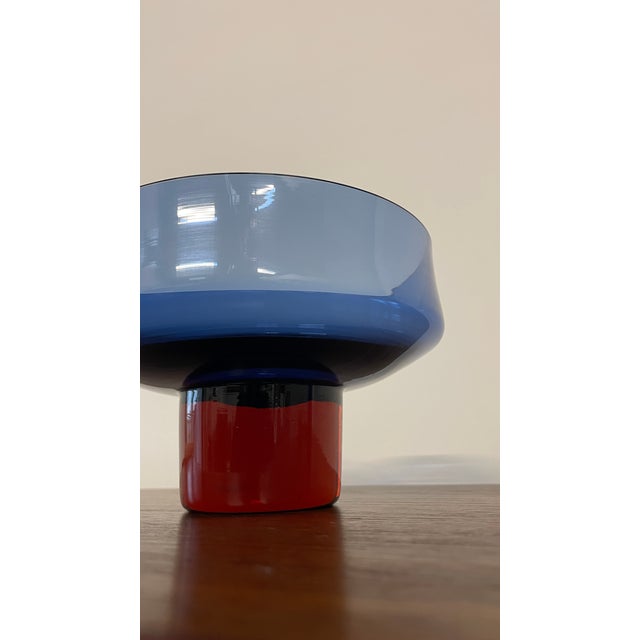 Designed by celebrated Swedish glass artist Bo Borgstrom, this refined art glass bowl was produced by Åseda Glasbruk...