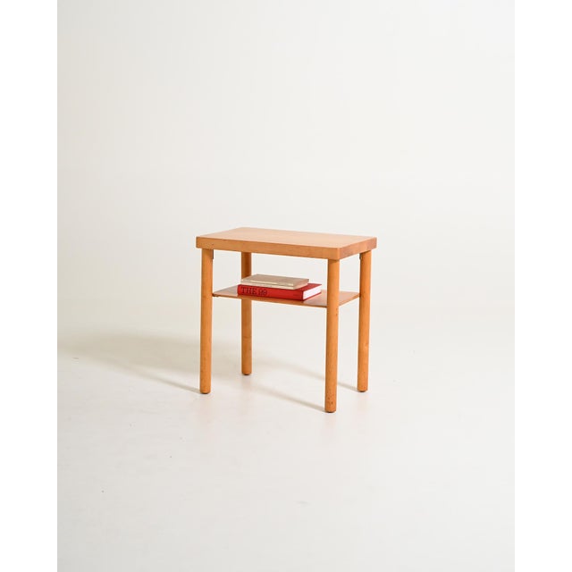 Birch coffee table with lower shelf. Scandinavian production, 1950s. Made in Scandinavia in the 1950s, this coffee table...