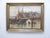 This Dutch school painting of a harbor scene is signed indistinctly in the lower left corner and has an old label on the...