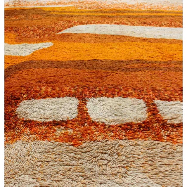 Measures: 5'4 x 7'7. This lovely Swedish Rya rug with modern design features a vibrant color palette of cream, brown, red,...