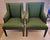 Sophisticated pair of tailored upholstered straight back club chairs having a lovely green fabric covering everywhere...