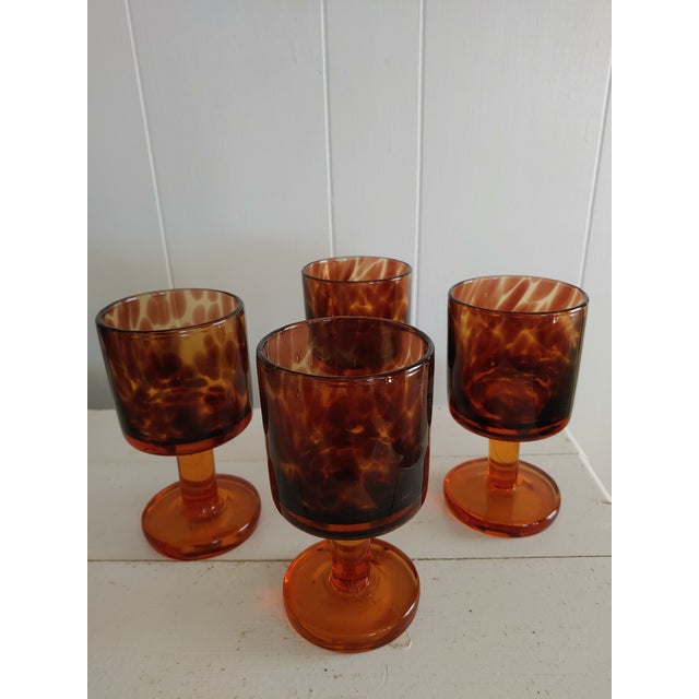 Here's a lovely set of hand blown goblets created in Mexico and sold at Pier 1 Imports in the late 20th Century. These are...